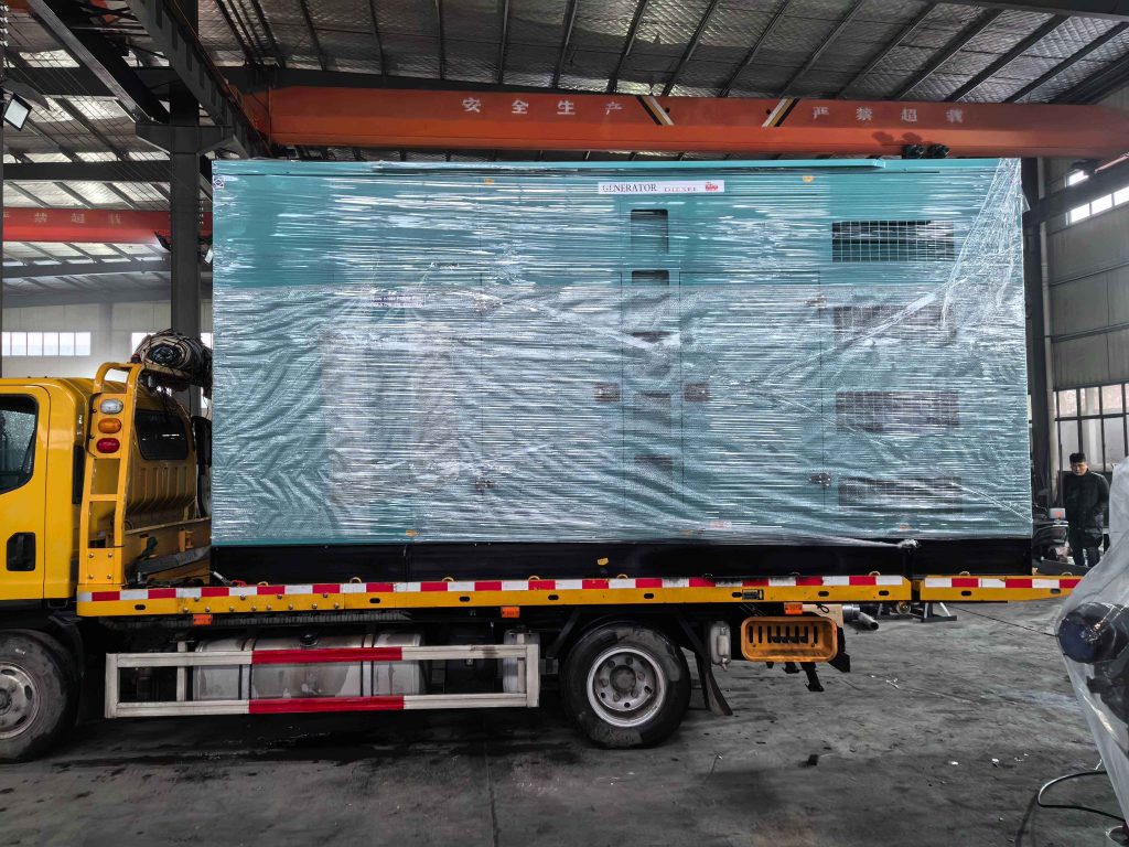 Containerised diesel generator set with ventilation louvres and an exhaust stack outside an industrial plant room